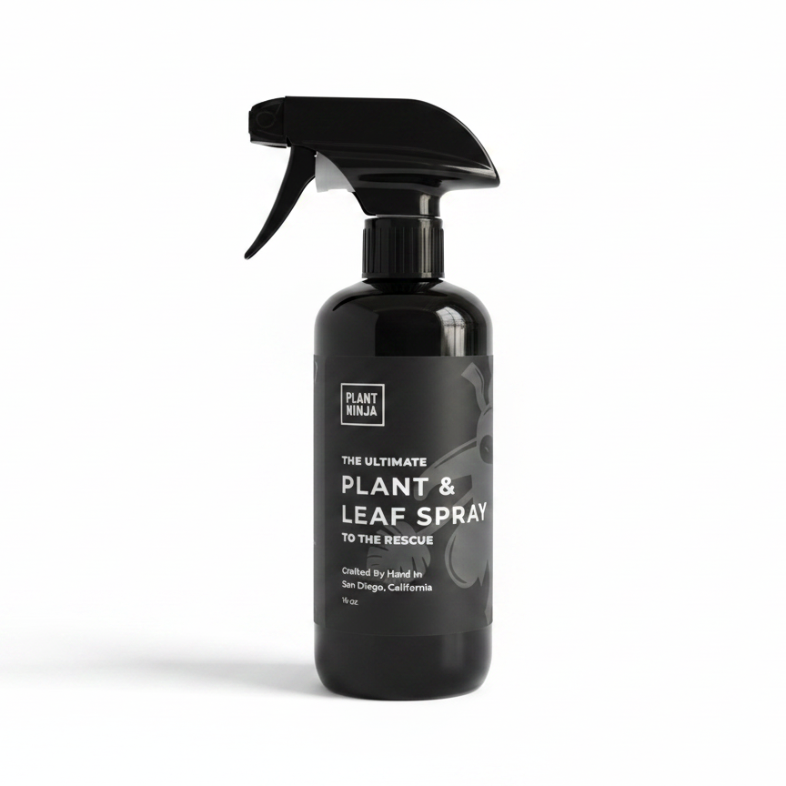 Black spray bottle labeled 'Plant Ninja The Ultimate Plants & Leaf Spray' on a white background