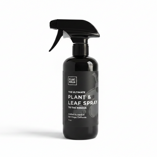 Black spray bottle labeled 'Plant Ninja The Ultimate Plants & Leaf Spray' on a white background
